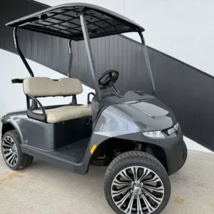 2025 E-Z-GO Freedom RXV EX1 in Metallic Charcoal, 2-seater petrol golf cart with machined alloy wheels, front three-quarter view