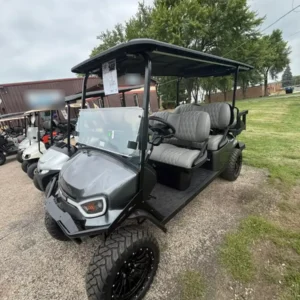 2026 E-Z-GO Express 6 Summit XT lifted six-seater petrol golf cart, front three-quarter view