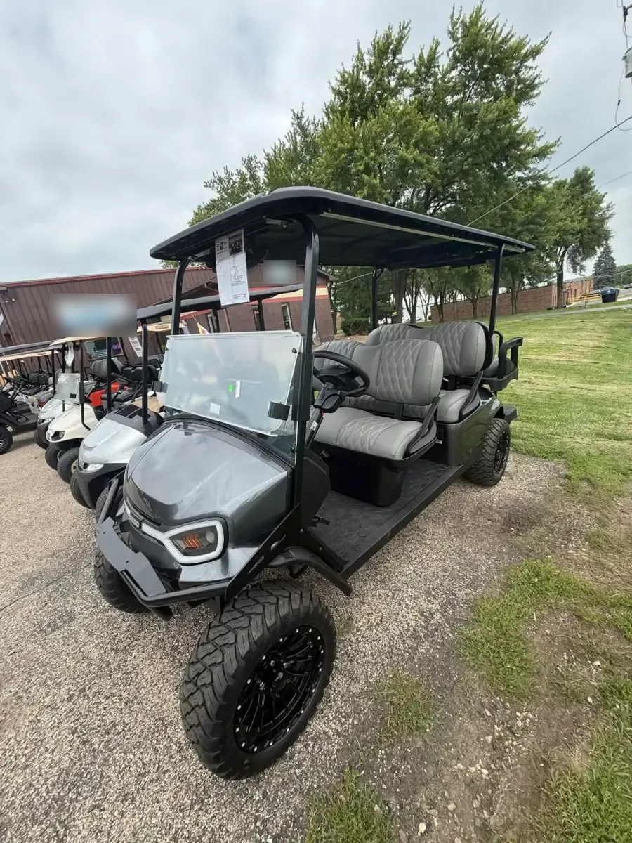 2026 E-Z-GO Express 6 Summit XT lifted six-seater petrol golf cart, front three-quarter view