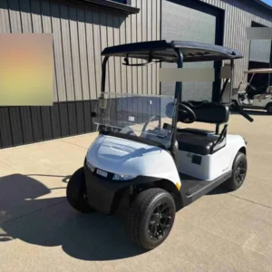 2026 E-Z-GO RXV Valor 2 S+ in White, 2-seater electric golf cart with windscreen, front three-quarter view
