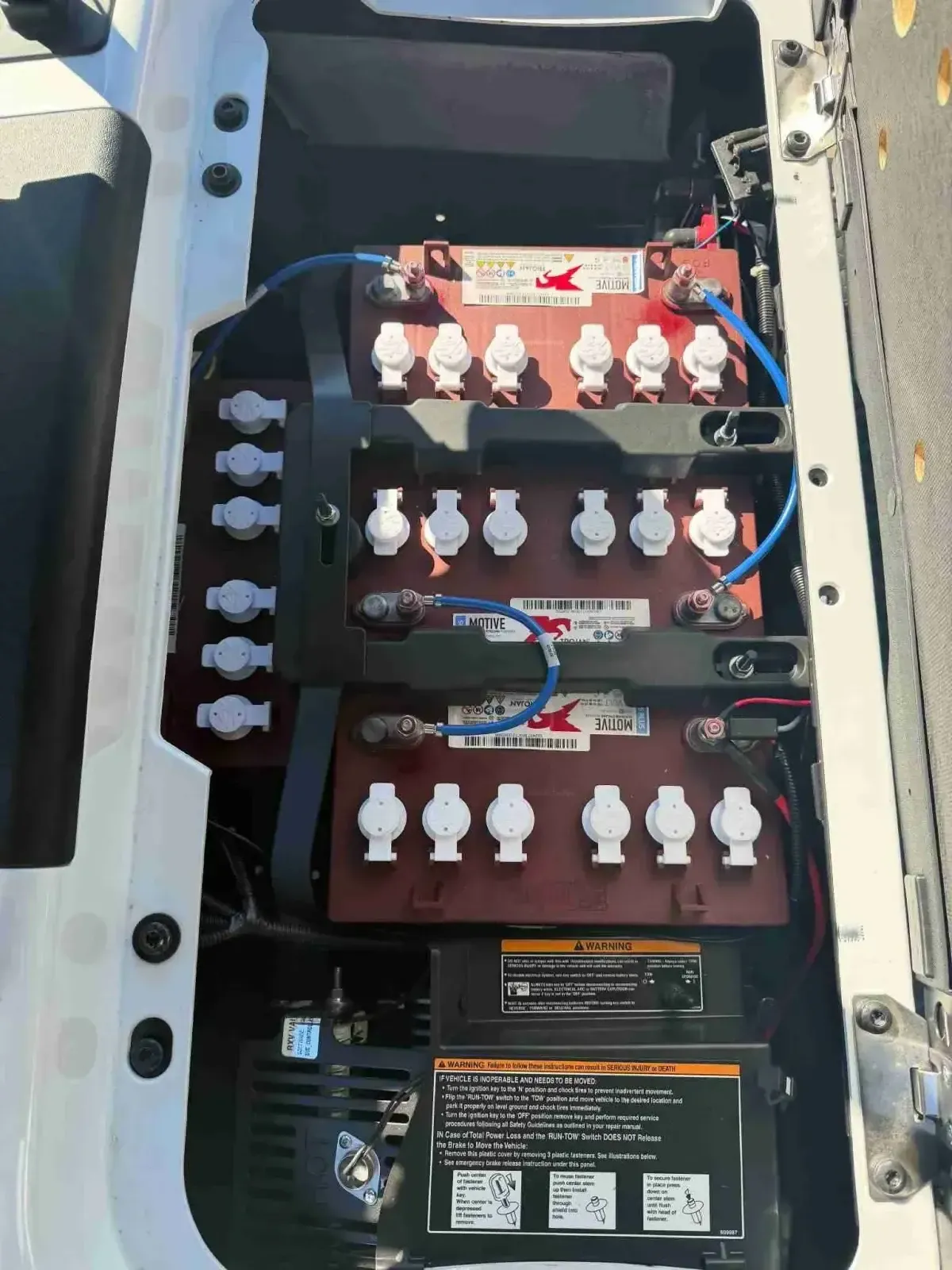 Battery compartment of the 2026 E-Z-GO RXV Valor 2 S+ 48V electric golf cart