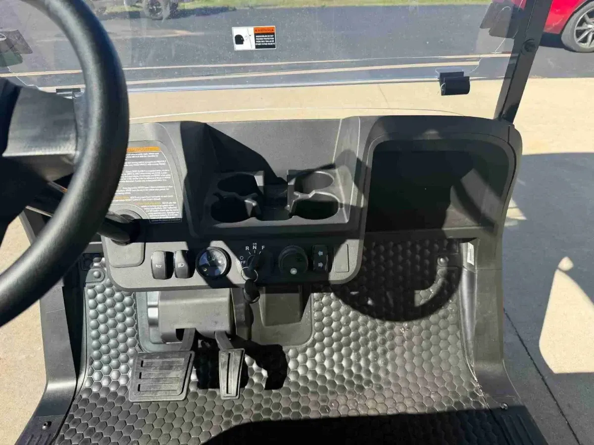 Dashboard with cup holders on the 2026 E-Z-GO RXV Valor 2 S+