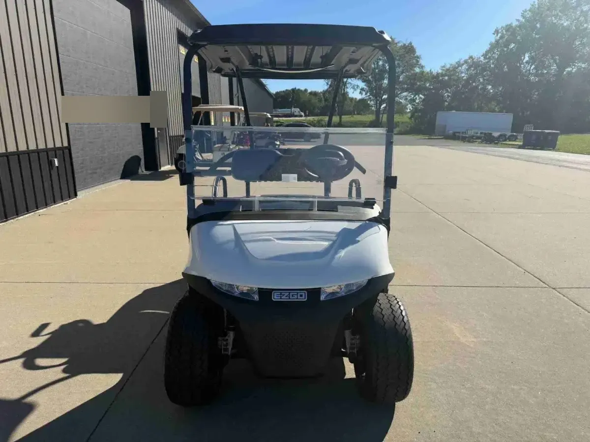 2026 E-Z-GO RXV Valor 2 S+ in White, front view with windscreen