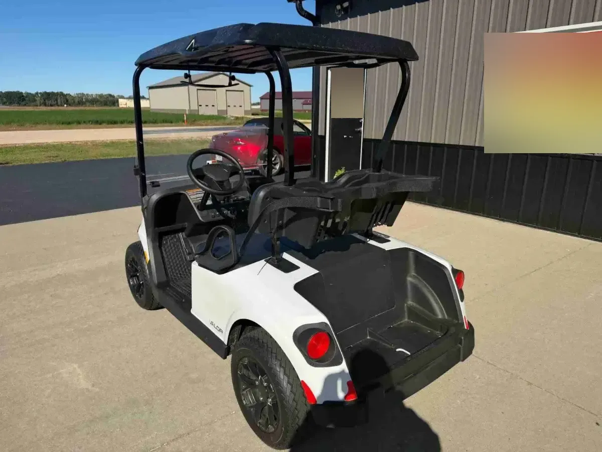 2026 E-Z-GO RXV Valor 2 S+ in White, rear left view with LED tail lights