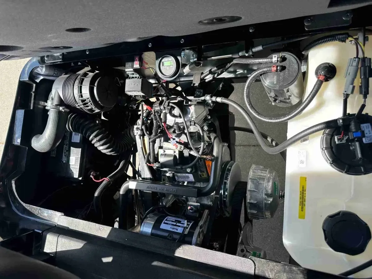 13.5 hp fuel-injected petrol engine of the 2027 E-Z-GO Express 4 Summit XT