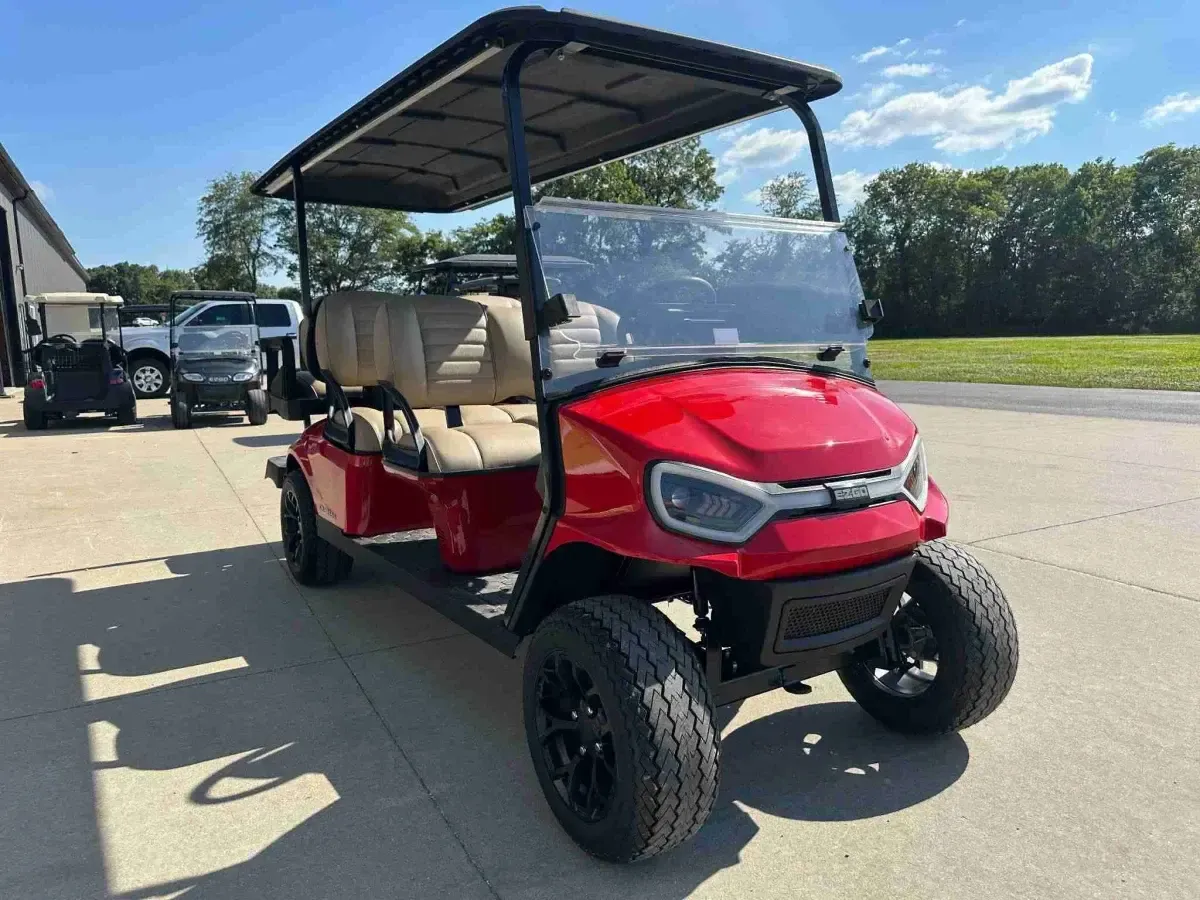 2027 E-Z-GO Express 6 Touring ST 6-seater petrol golf cart in Royal Red Metallic, front three-quarter view