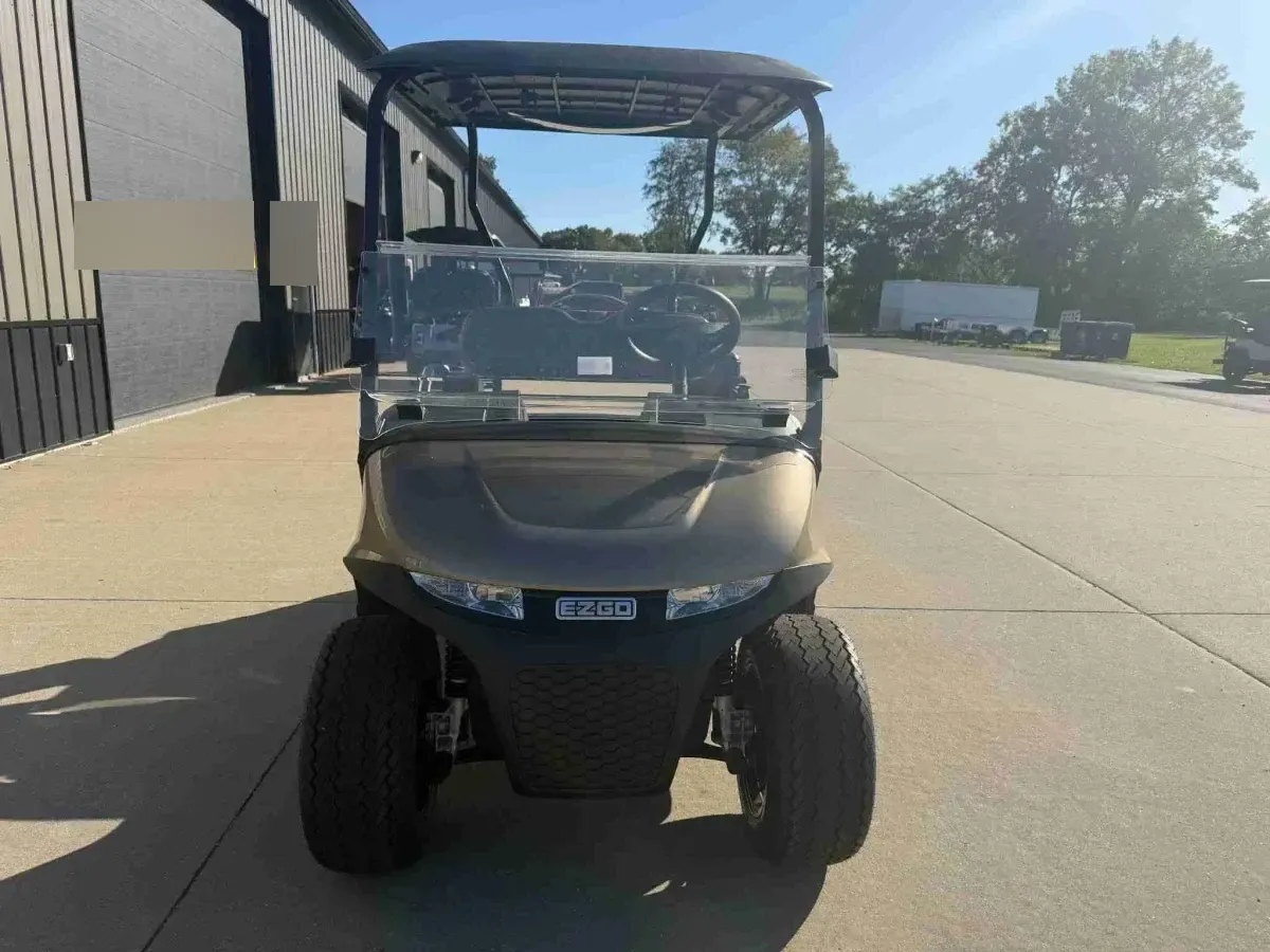 2027 E-Z-GO RXV Touring ELiTE Lithium in Bronze, front view with LED headlights