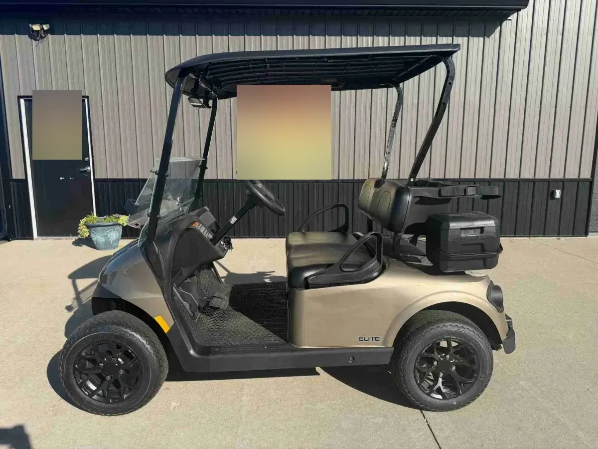 2027 E-Z-GO RXV Touring ELiTE Lithium in Bronze, side profile with black seats and alloy wheels
