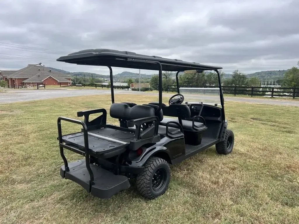 Rear seat of the E-Z-GO Express 6 Summit X folded down into a flat cargo deck