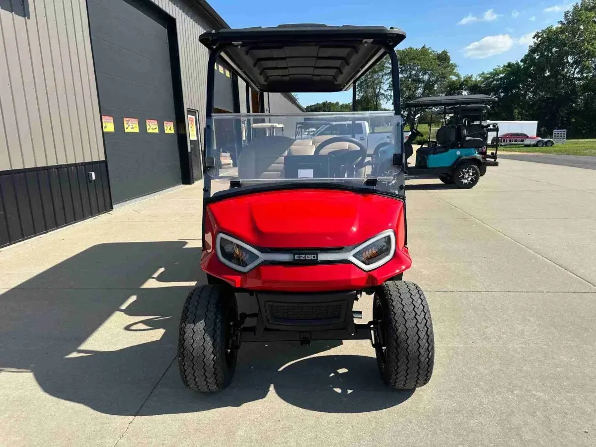 Front of the E-Z-GO Express 6 Touring ST showing its LED headlights and windscreen