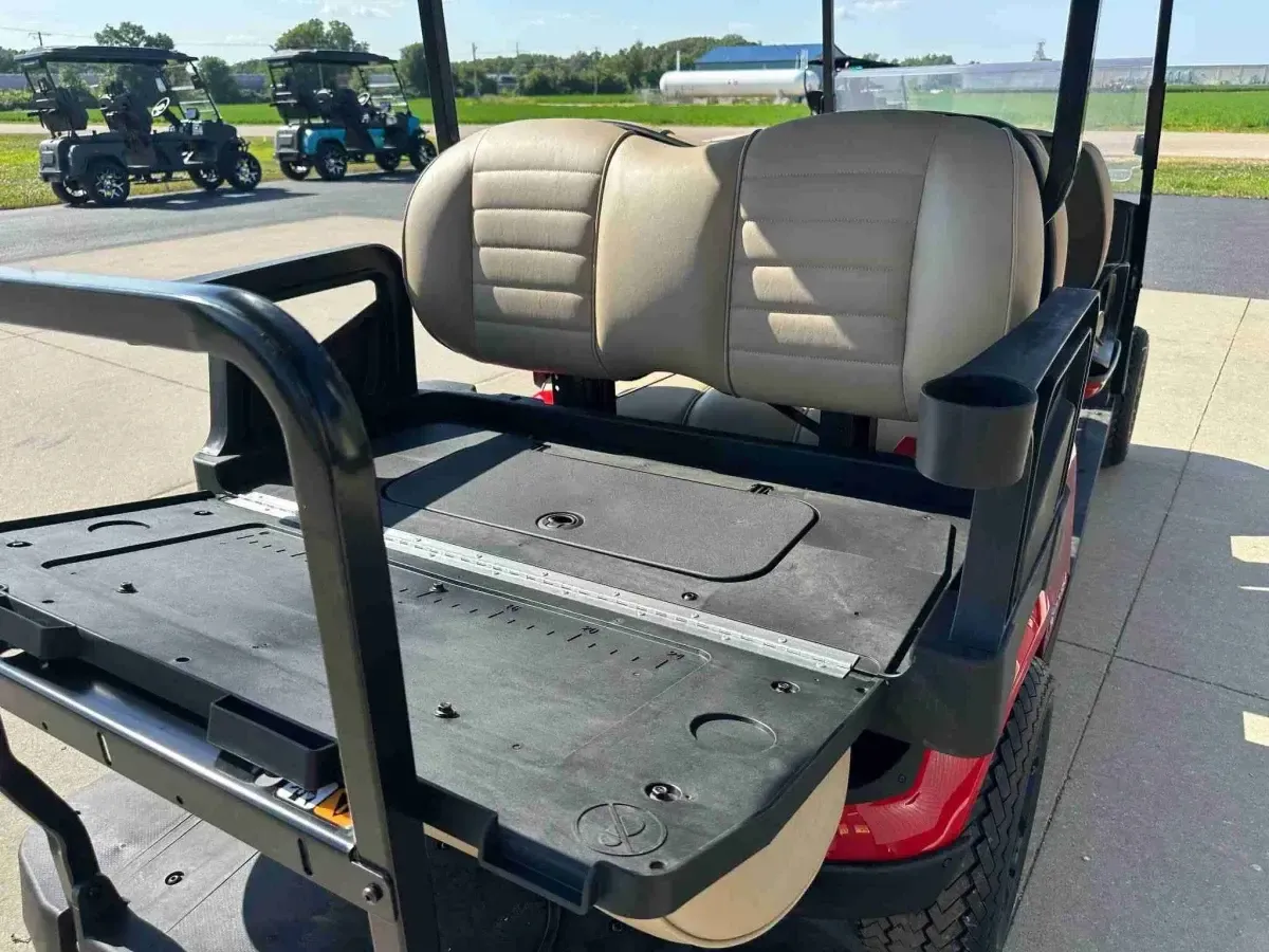 Rear seat of the E-Z-GO Express 6 Touring ST folded down into a flat cargo deck