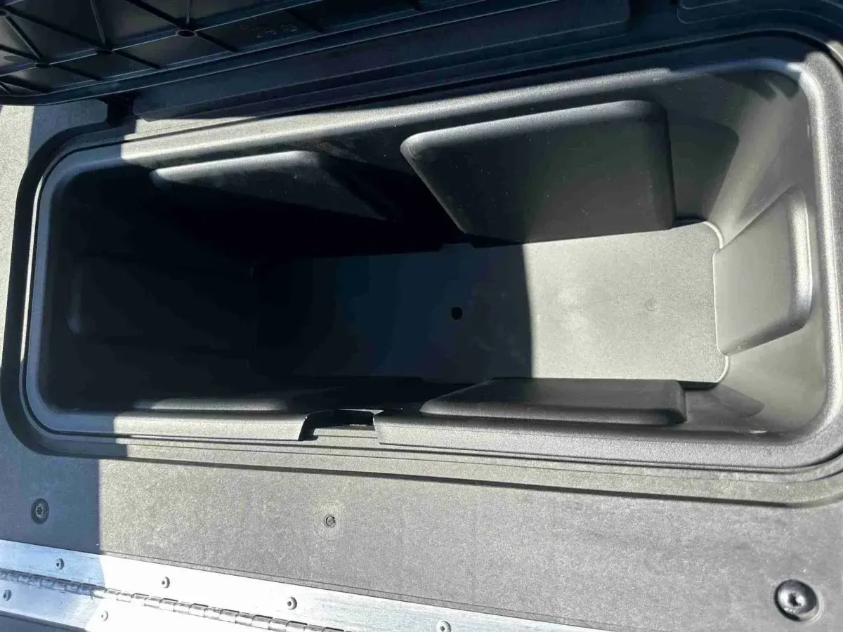 Under-seat storage compartment on the E-Z-GO Express 6 Touring ST
