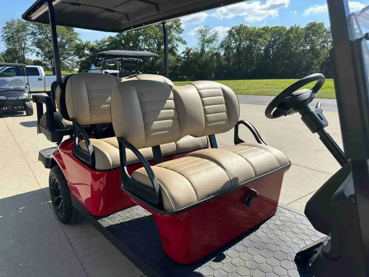 Tan front and middle bench seats on the E-Z-GO Express 6 Touring ST